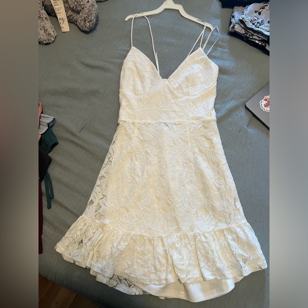 White mini dress, perfect for graduation season and the summer! Worn once